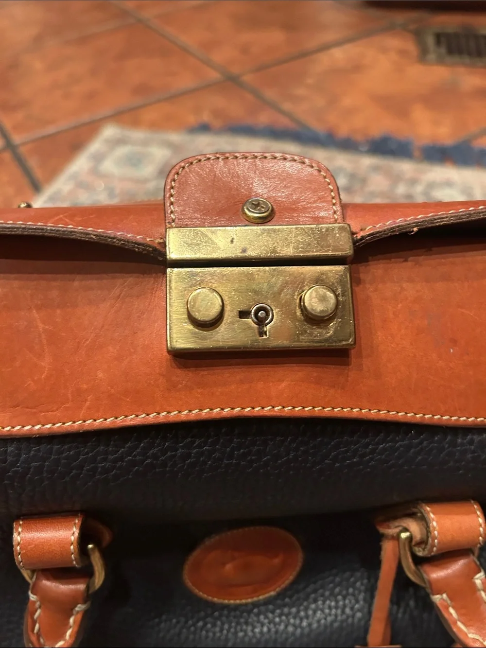 Dooney & Bourke Navy Pebble Leather Satchel with Tan Trim